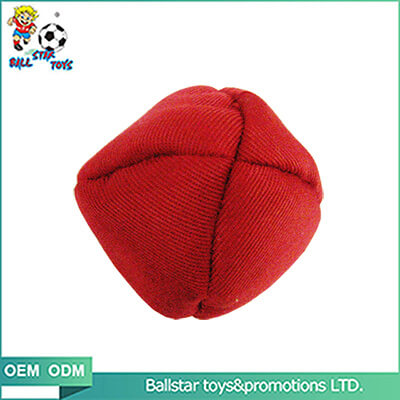 red stuffed juggling ball