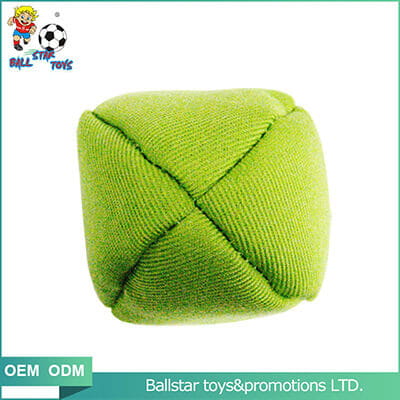 green stuffed juggling ball