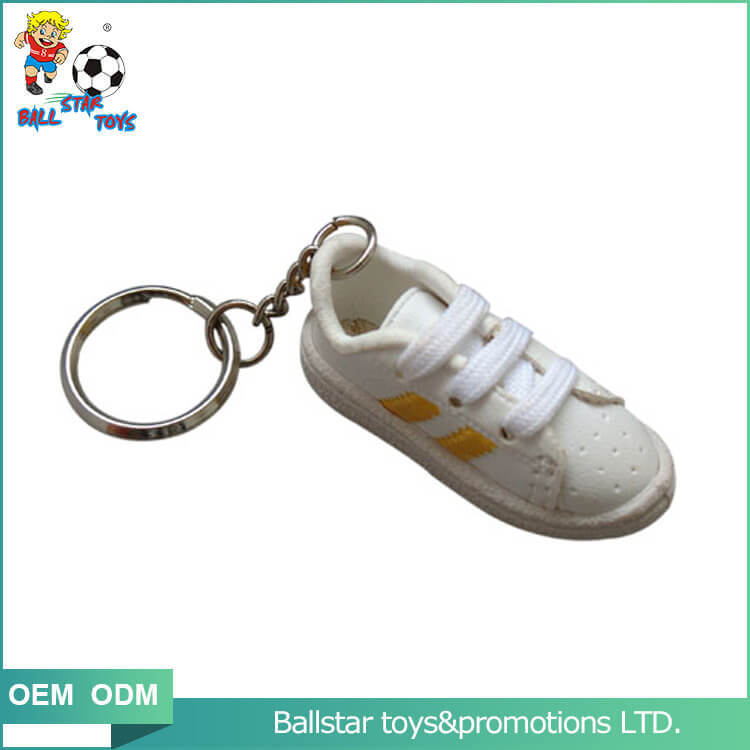 cuddly small white shoe keyring